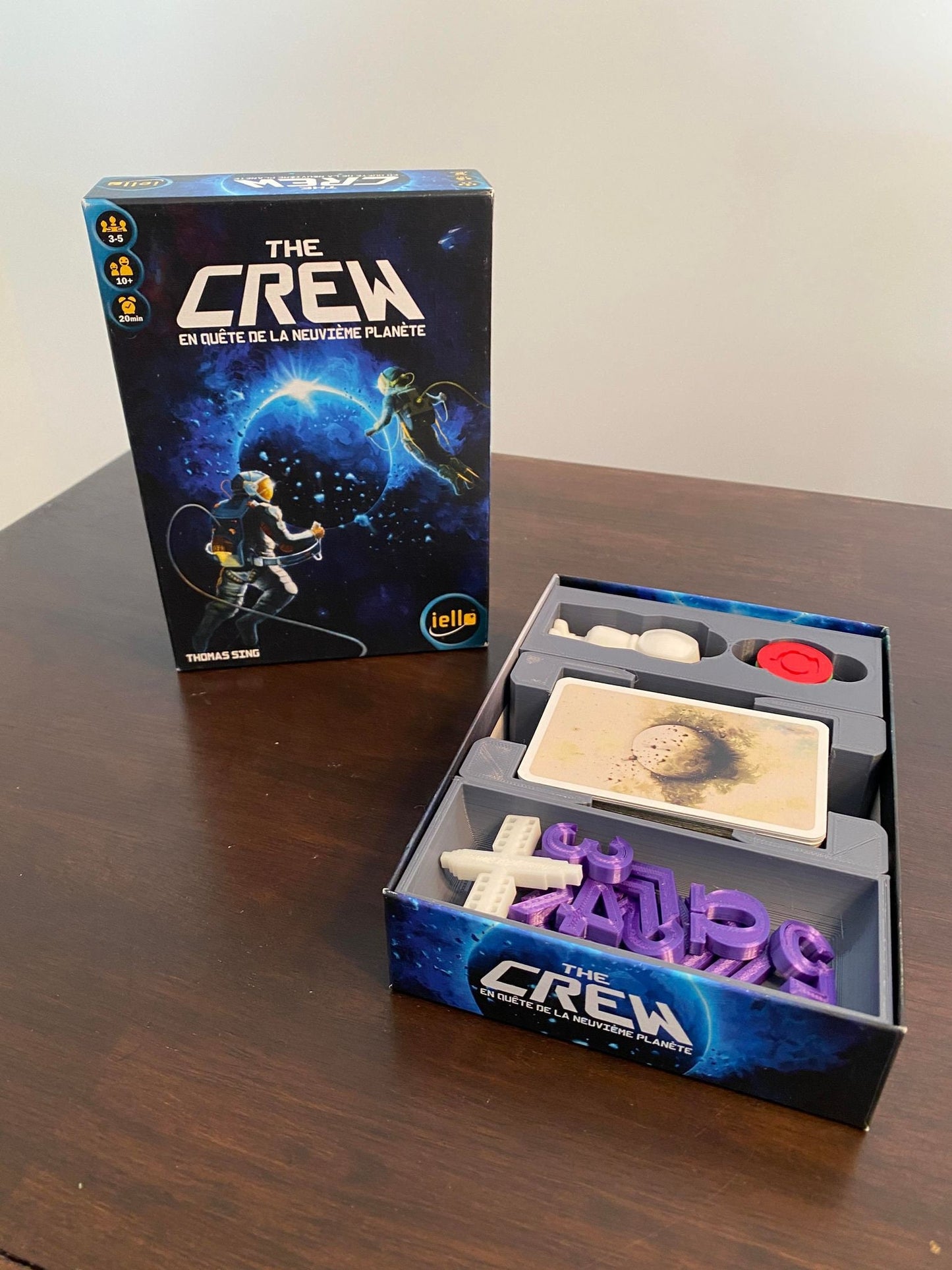 The crew board game insert and tokens